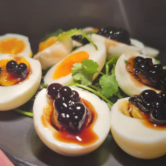 Deviled Eggs for easter with sticky balsamic pearls