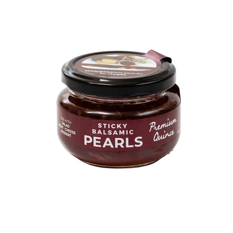 Sticky balsamic pearls jar with “Premium Quince” label on lid