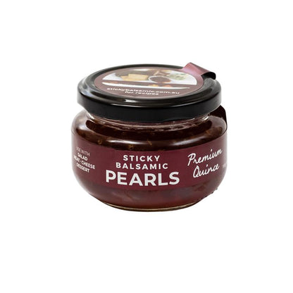 Sticky balsamic pearls jar with “Premium Quince” label on lid