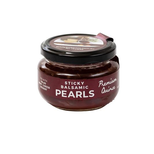 Sticky balsamic pearls jar with “Premium Quince” label on lid