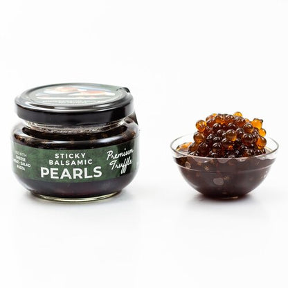 Sticky balsamic truffle pearls jar and bowl of dark pearls