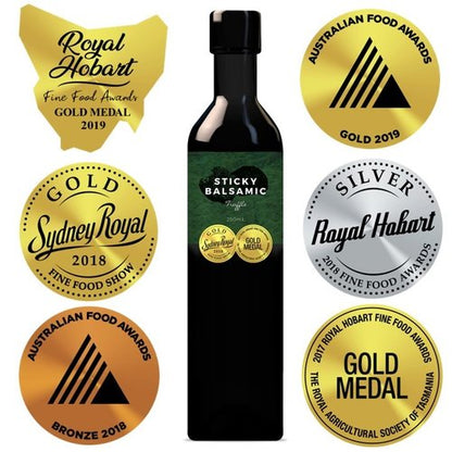 Sticky balsamic bottle with gold and silver award seals and green label